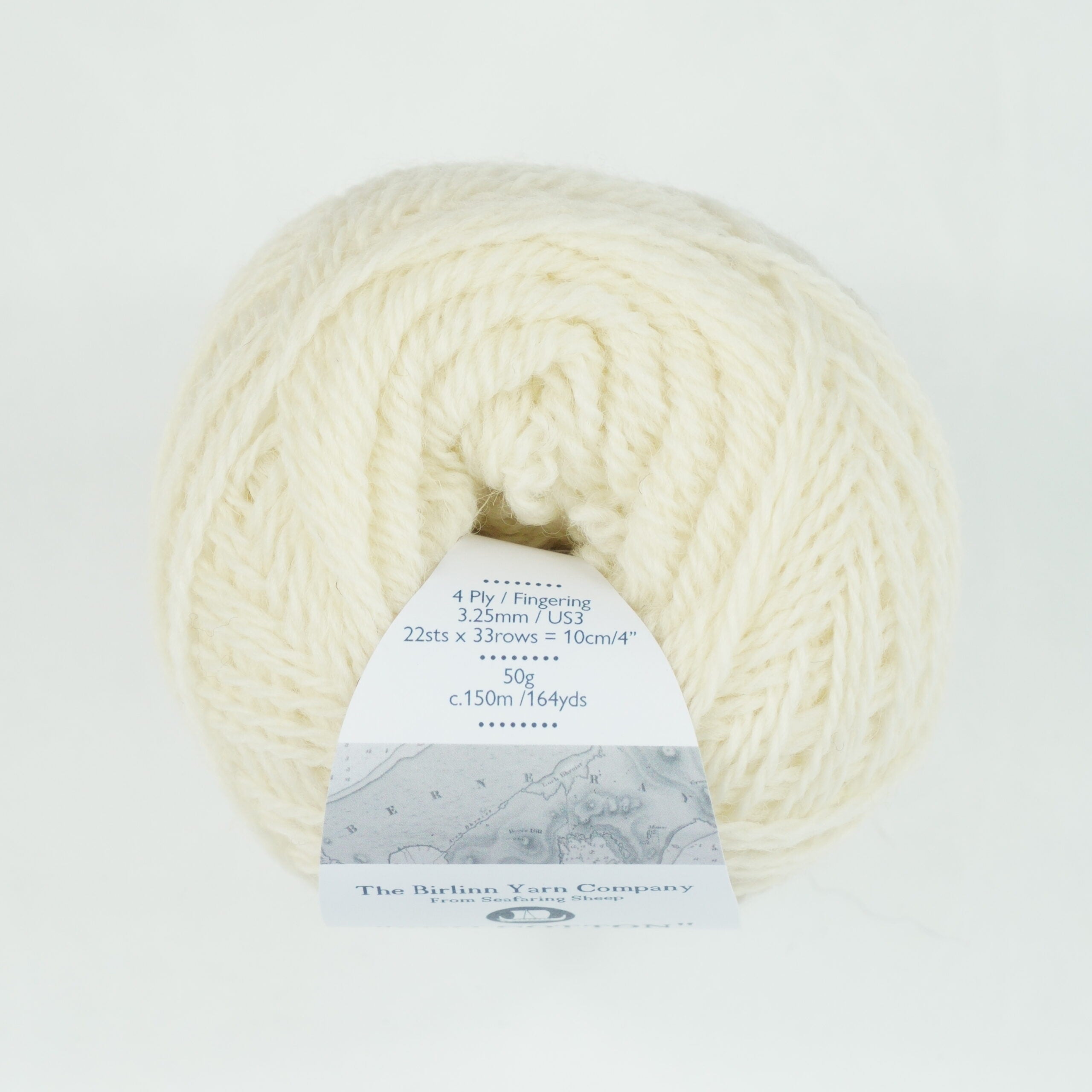 Ball of Bog Cotton from above: A warm, creamy, white yarn
