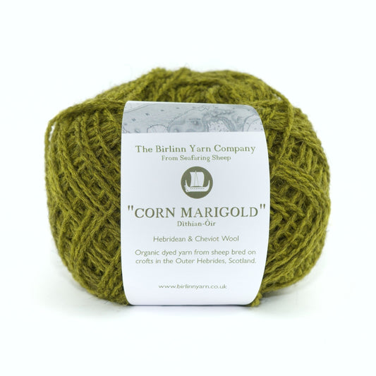 ball of Cornmarigold with label: a bright green