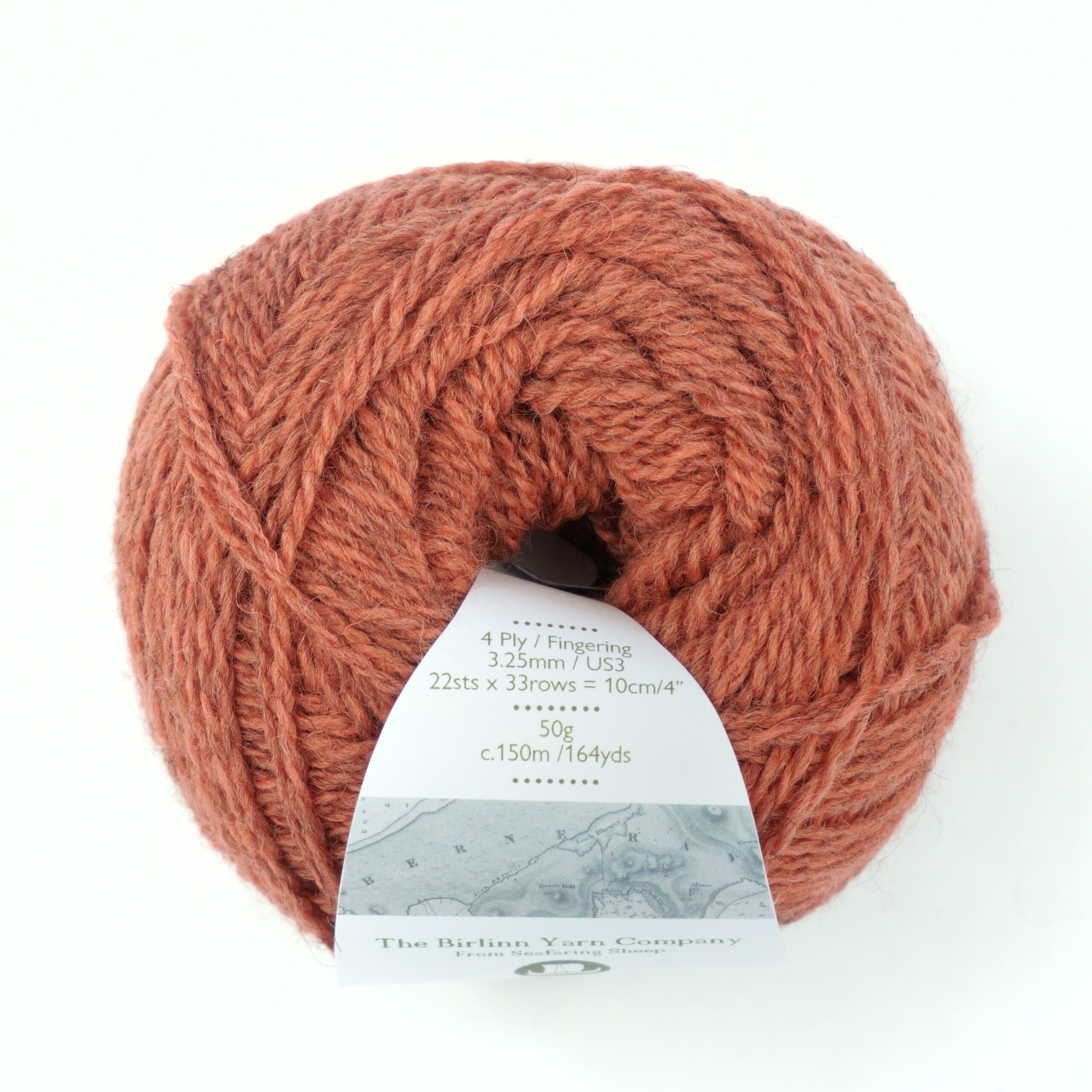 ball of Cowrie from above: soft, peachy pink