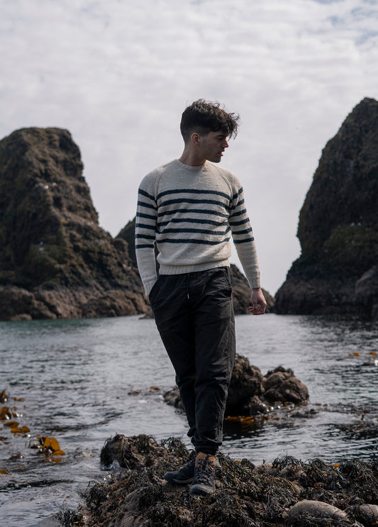 Endeavour by Lauriane Bernard. Bretton style striped sweater worn outside on the coast