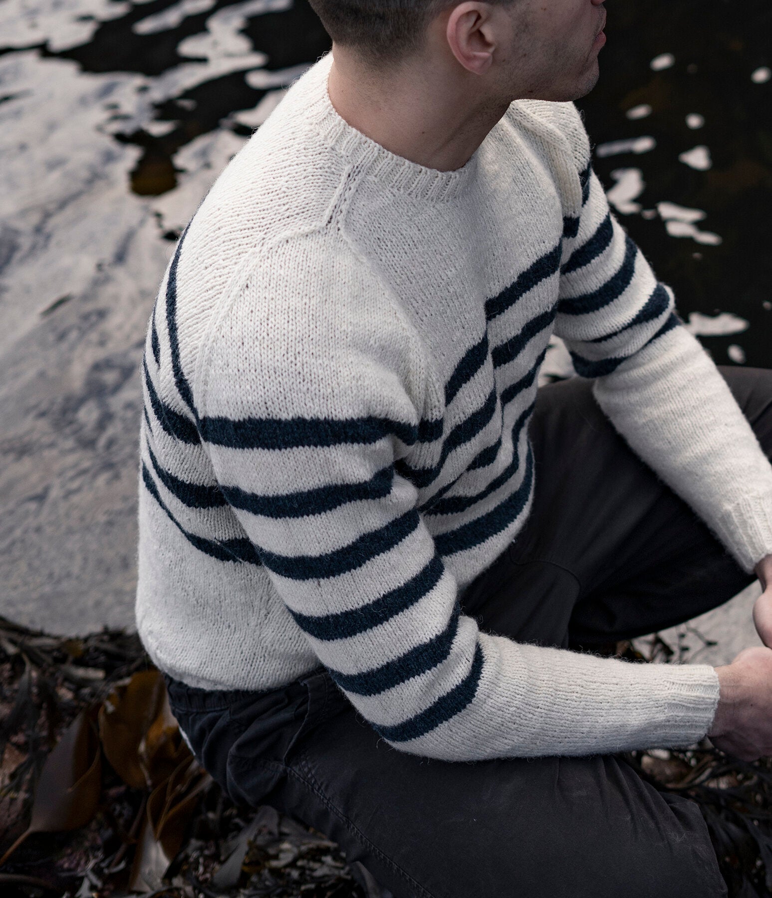Endeavour by Lauriane Bernard. Bretton style striped sweater worn outside on the coast