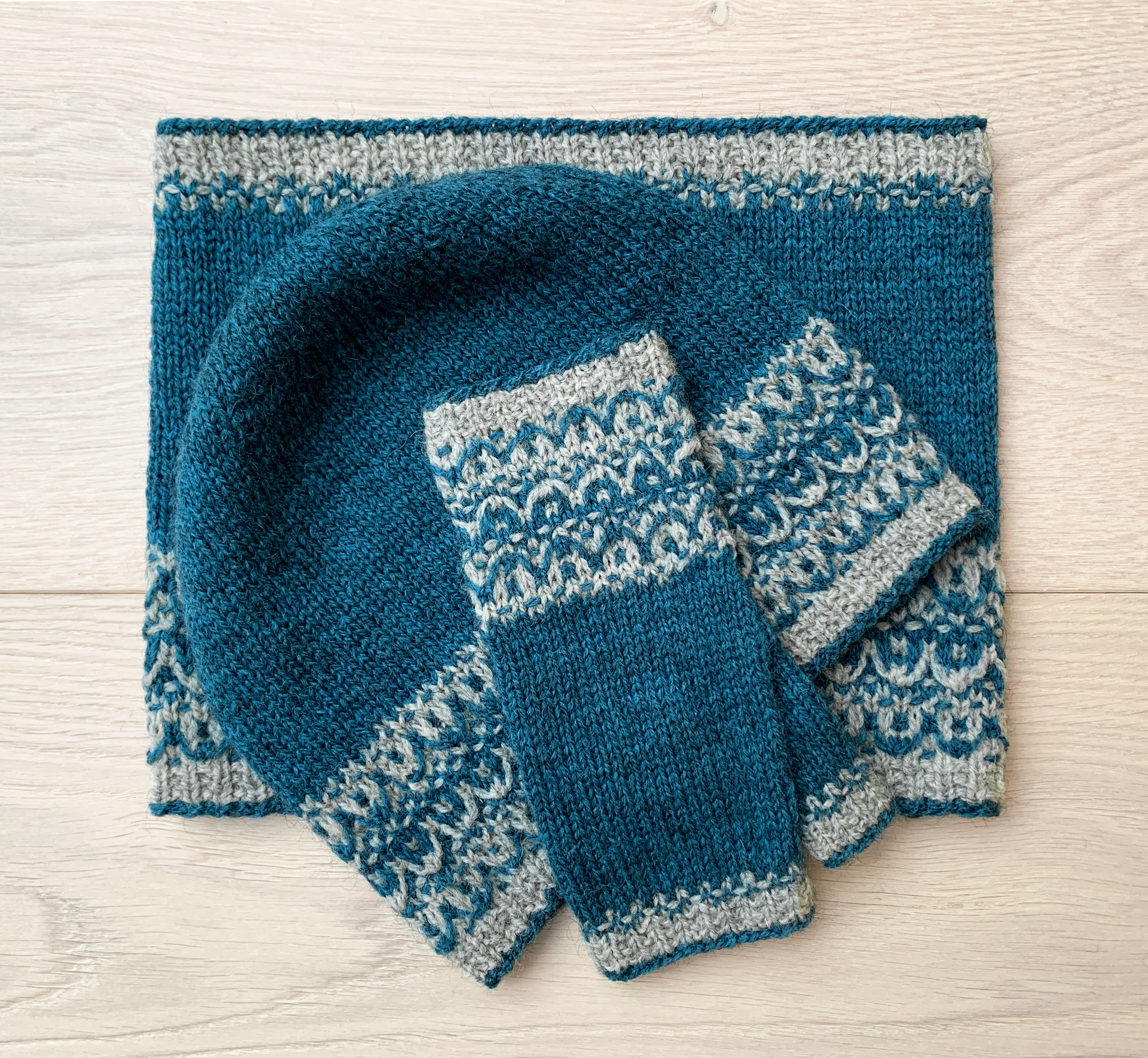 Tiny Boats by Elizabeth Doherty. Fingerless mitts, cowl and hat with slip-stitch patterns, reminiscent of the Viking sailing ships